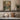 Across the Little Bridge Wall Art in a Gold Ornate Frame on a kitchen shelf
