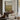 Across the Meadow Wall Art in a Black Floating Frame above a walnut console in a sitting room