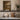Bench Beneath the Oak Wall Art in a Black Floating Frame on a kitchen shelf