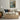 Beneath the Seawall Wall Art in a Gold Ornate Frame above a cream sofa in a living room