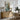 Beneath the Seawall Wall Art in a Natural Floating Frame above an oak sideboard in a dining room