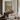 Blossom over the Towpath Wall Art in a Gold Ornate Frame above a walnut console in a sitting room