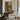 Bridge over the Mill Stream Wall Art in a Gold Ornate Frame above a walnut console in a sitting room