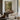 Citrus in the Winter House Wall Art in a Gold Ornate Frame above a walnut console in a sitting room