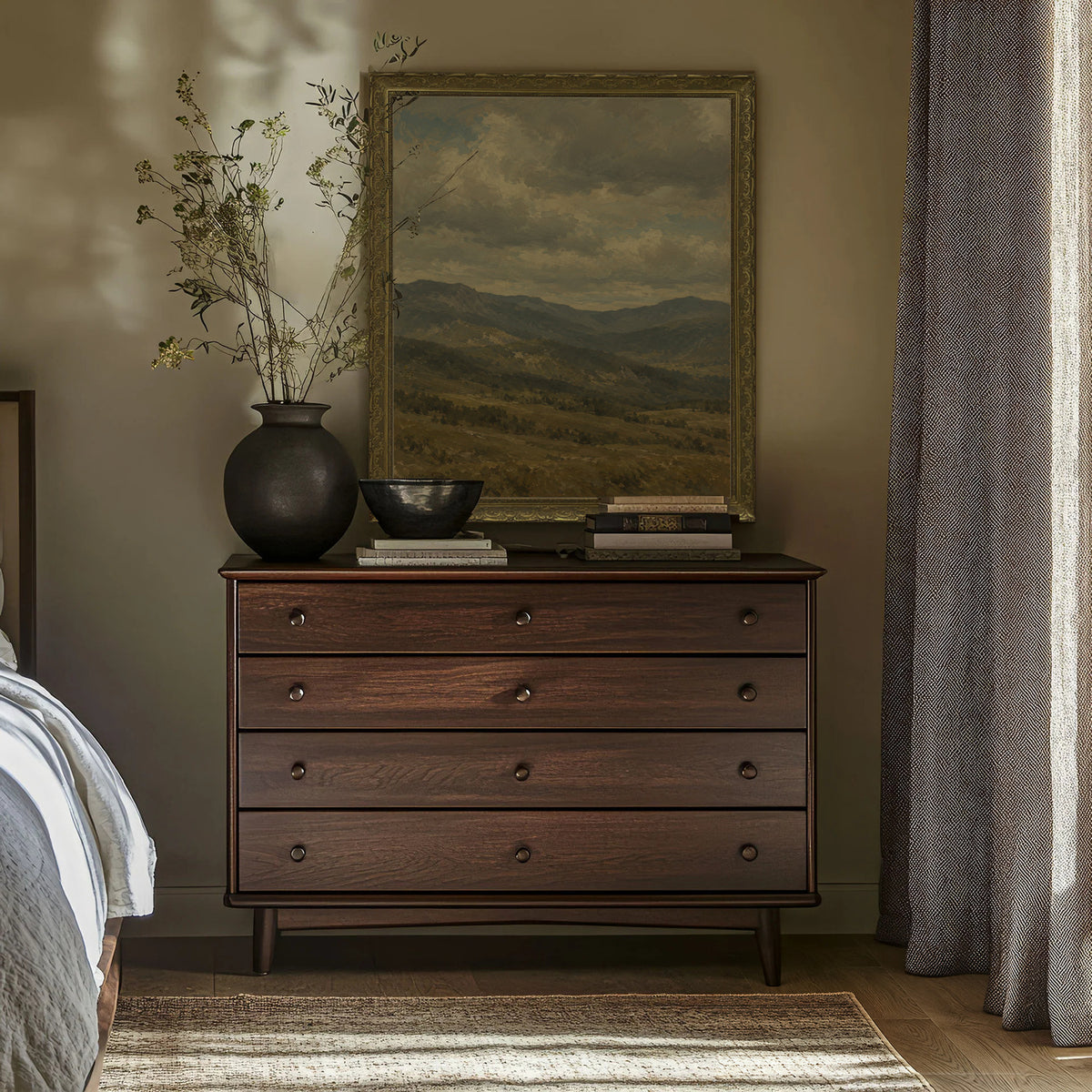 Clouds over the Ridge Wall Art in a Gold Ornate Frame above a walnut dresser in a bedroom