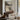 Footbridge in Snow Wall Art in a Black Floating Frame above a walnut console in a sitting room
