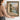 From the Loggia Wall Art in a Gold Ornate Frame, held to show its size