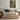 Inside the Glasshouse Wall Art in a Black Floating Frame above a cream sofa in a living room
