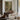 Inside the Glasshouse Wall Art in a Gold Ornate Frame above a walnut console in a sitting room