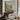 Meadow at the River Bend Wall Art in a Black Floating Frame above a walnut console in a sitting room
