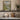 Meadow at the River Bend Wall Art in a Gold Ornate Frame on a kitchen shelf