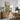 Meadow at the River Bend Wall Art in a Natural Floating Frame above an oak sideboard in a dining room