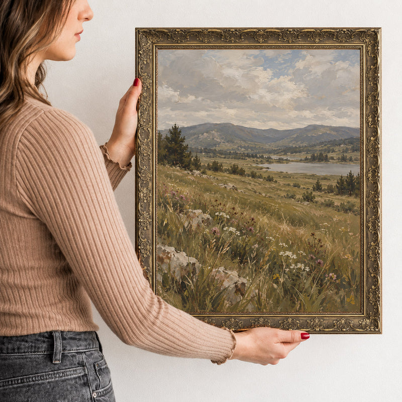Meadow Beneath the Ridge Wall Art in a Gold Ornate Frame, held to show its size