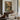 Palazzo on Still Water Wall Art in a Gold Ornate Frame above a walnut console in a sitting room