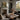 Palazzo on Still Water Wall Art in a White Floating Frame on a fireplace mantel