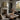 Passage to the Canal Wall Art in a Natural Floating Frame on a fireplace mantel