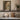 Passage to the Canal Wall Art in a White Floating Frame on a kitchen shelf
