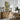 Rowboat Beneath the Willow Wall Art in a Natural Floating Frame above an oak sideboard in a dining room