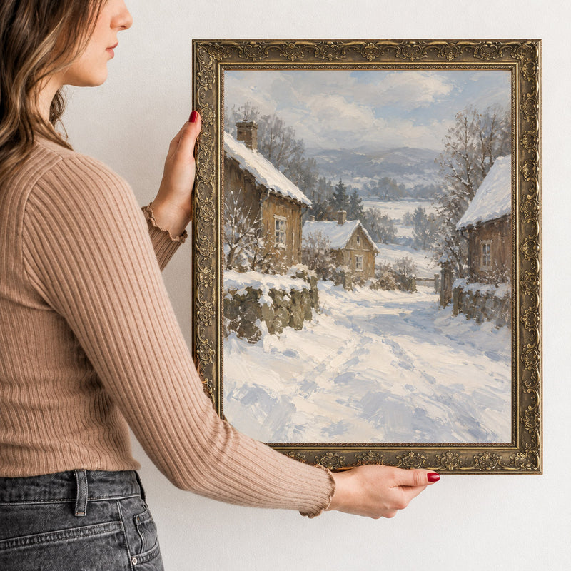 Snow on the Village Lane Wall Art in a Gold Ornate Frame, held to show its size