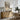 Snow on the Village Lane Wall Art in a Natural Floating Frame above an oak sideboard in a dining room