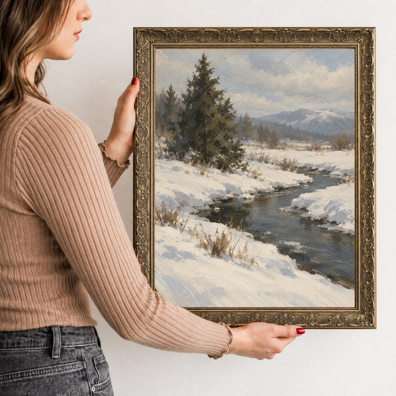 Spruce by the Winter Stream Wall Art in a Gold Ornate Frame, held to show its size