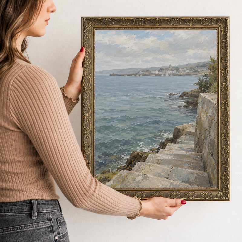 Steps to the Tide Wall Art in a Gold Ornate Frame, held to show its size