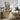 Steps to the Tide Wall Art in a Natural Floating Frame above an oak sideboard in a dining room