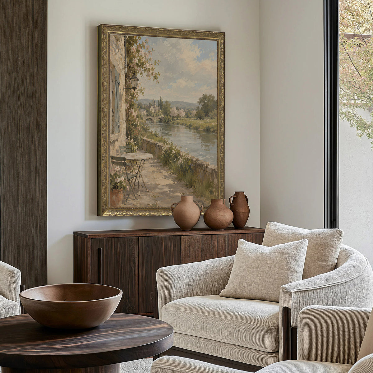 Table by the River Wall Art in a Gold Ornate Frame above a walnut console in a sitting room