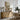 Table by the River Wall Art in a Natural Floating Frame above an oak sideboard in a dining room