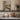 Table by the River Wall Art in a White Floating Frame on a kitchen shelf