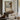 Thaw at the Eaves Wall Art in a Gold Ornate Frame above a walnut console in a sitting room
