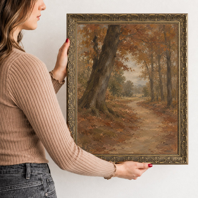The Beech Avenue Wall Art in a Gold Ornate Frame, held to show its size