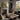 The Flowering Steps Wall Art in a Natural Floating Frame on a fireplace mantel