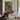 The Glasshouse Door Wall Art in a Black Floating Frame above a walnut console in a sitting room