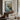 The Granite Quay Wall Art in a Black Floating Frame above a walnut console in a sitting room