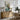 The Granite Quay Wall Art in a Natural Floating Frame above an oak sideboard in a dining room