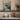 The Granite Quay Wall Art in a White Floating Frame on a kitchen shelf
