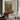 The High Pasture Wall Art in a Black Floating Frame above a walnut console in a sitting room