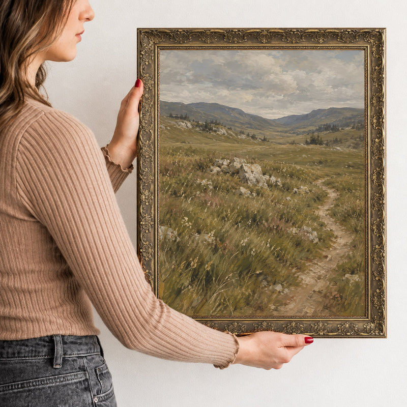The High Pasture Wall Art in a Gold Ornate Frame, held to show its size