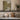 The Lily Pond Wall Art in a Black Floating Frame on a kitchen shelf
