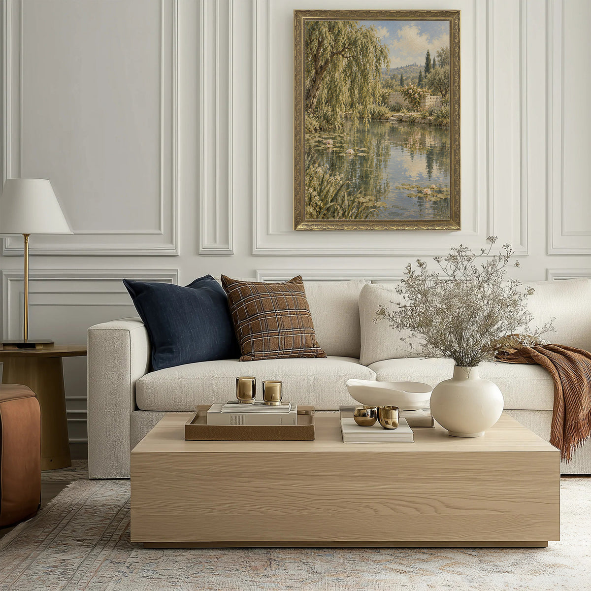 The Lily Pond Wall Art in a Gold Ornate Frame above a cream sofa in a living room