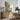 The Lily Pond Wall Art in a Natural Floating Frame above an oak sideboard in a dining room