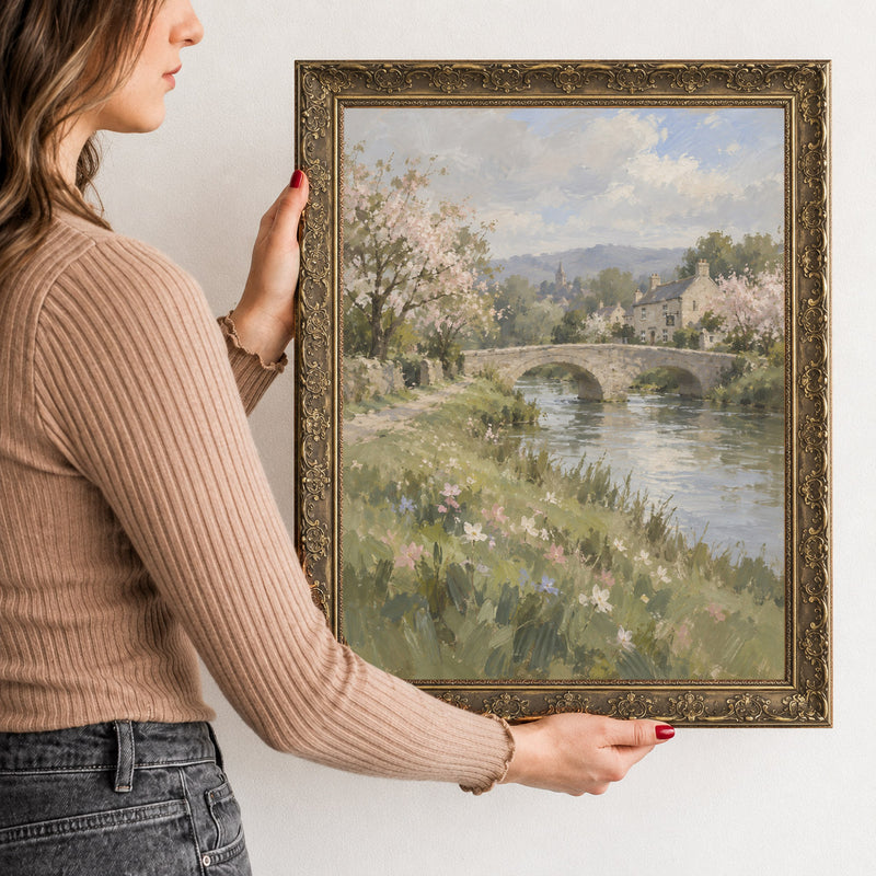 The Low Footbridge Wall Art in a Gold Ornate Frame, held to show its size