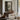 The Net Loft Wall Art in a Black Floating Frame above a walnut console in a sitting room