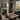 The Old Boathouse Wall Art in a Black Floating Frame on a fireplace mantel