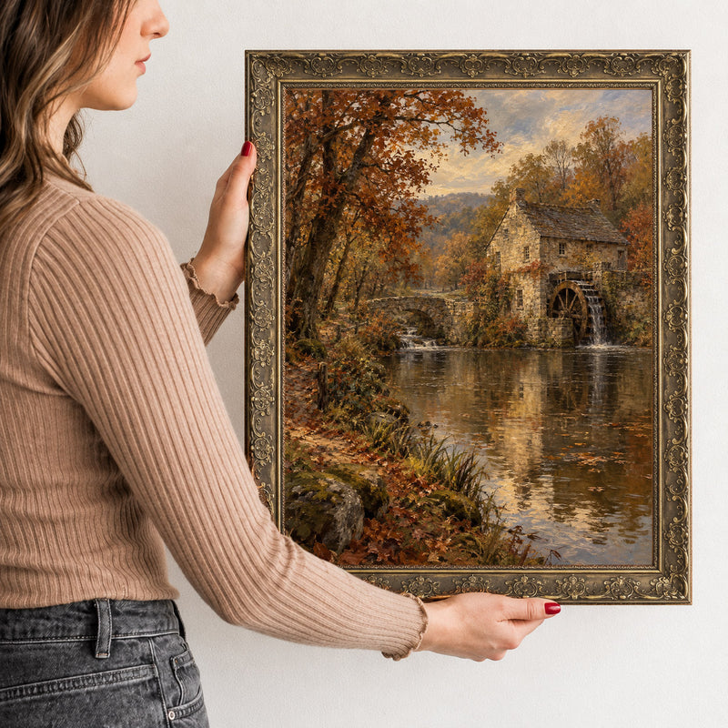 The Old Mill Wall Art in a Gold Ornate Frame, held to show its size