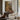 The Path to the Lodge Wall Art in a Black Floating Frame above a walnut console in a sitting room