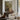 The Potting Bench Wall Art in a Black Floating Frame above a walnut console in a sitting room