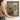 The Potting Bench Wall Art in a Gold Ornate Frame, held to show its size