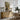 The Potting Bench Wall Art in a Natural Floating Frame above an oak sideboard in a dining room